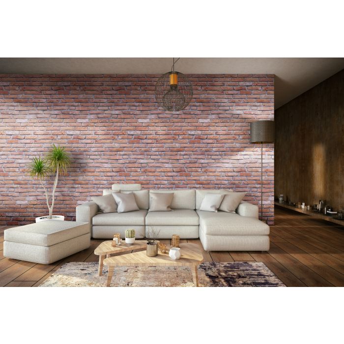 A modern living room with a white sofa, a wooden coffee table and an exposed brick panelled feature wall.